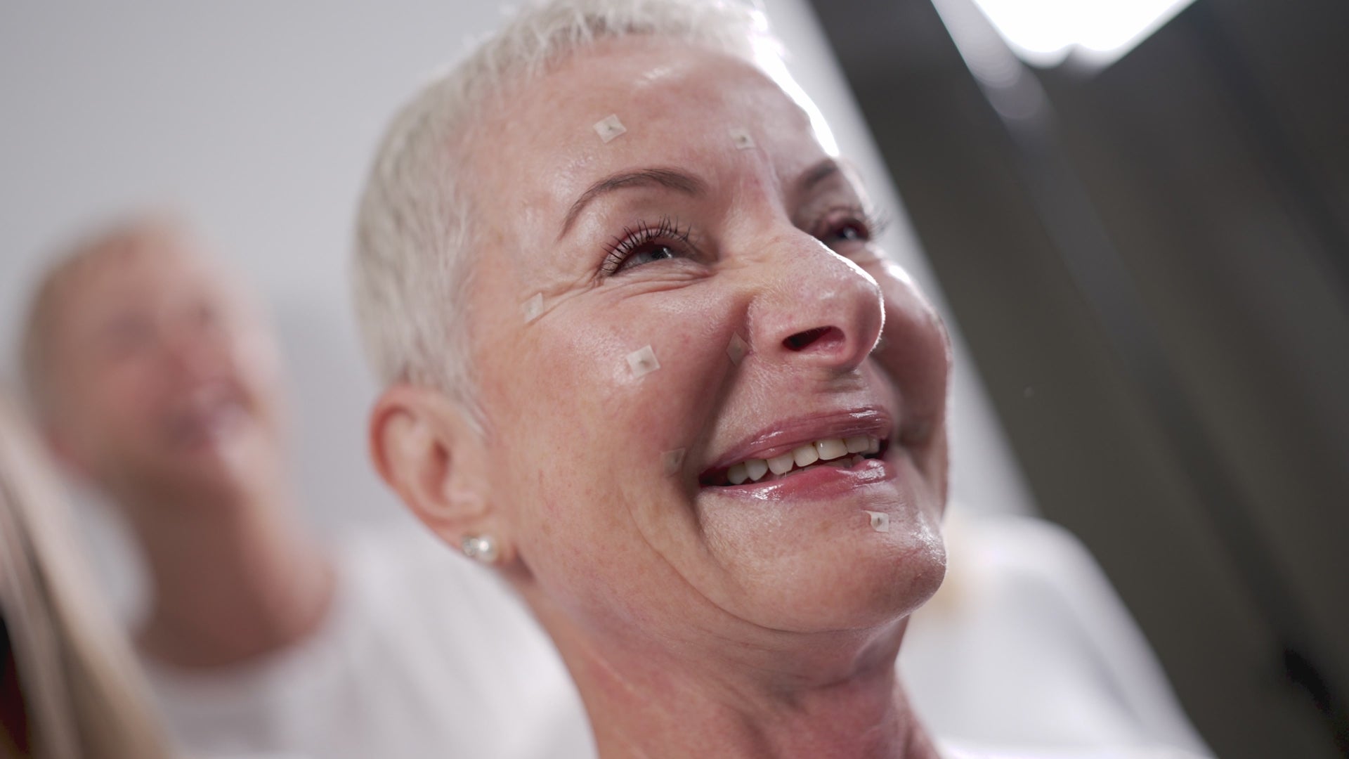 Load video: Video showing Women wearing the Home Kit and applying skin serums